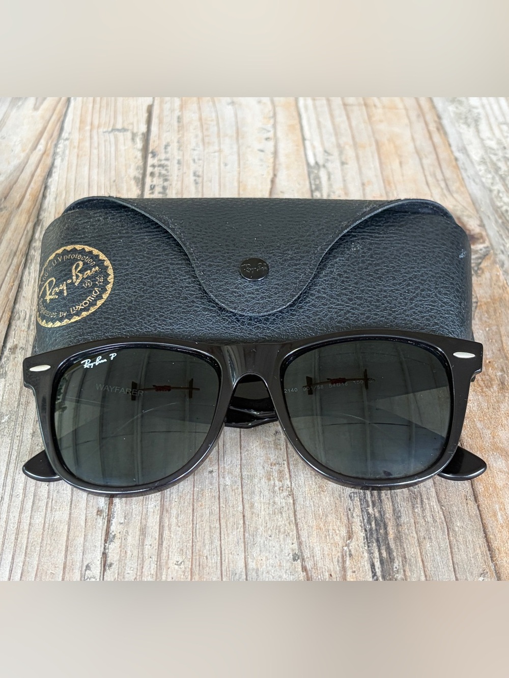 Ray-Ban Black Wayfarer Sunglasses with Dark Lenses